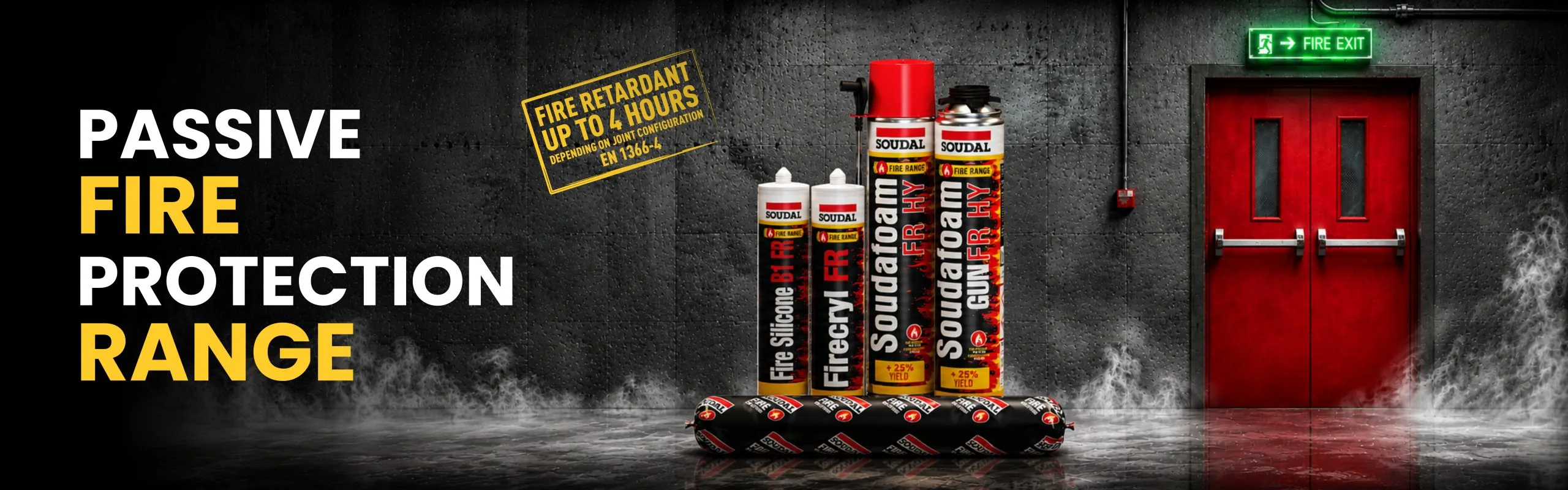 Bold banner for Passive Fire Protection Range with white and yellow text on a black wall; Soudal fireproofing cans and foam displayed on the floor.
